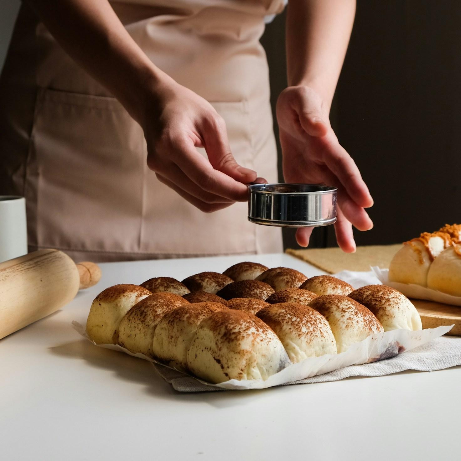 Diverse group of community members sharing a meal together, showcasing the social bonds formed through collaborative cooking